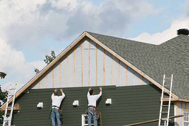 Professional Siding Contractor technician working in Enon, VA